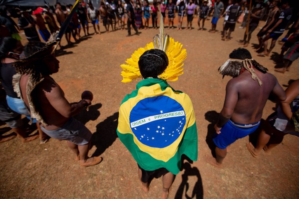 Indigenous Brazilians protest in front of Government House in defense of their lands