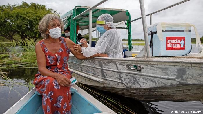 Woman vaccinated on a boat in Brazil