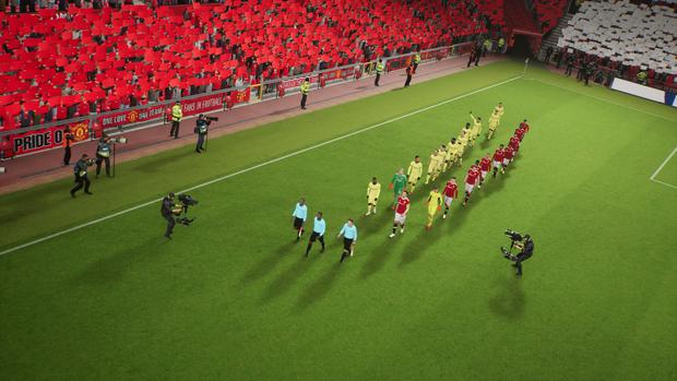 Players enter the football field.  (Photo: Konami)