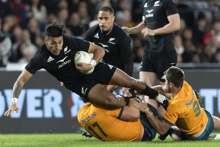 Rieko Ioane tackled by Angus Bell and Jake Gordon.  New Zealand was very good