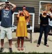 People watch the solar eclipse with eclipse glasses or special filters for binoculars