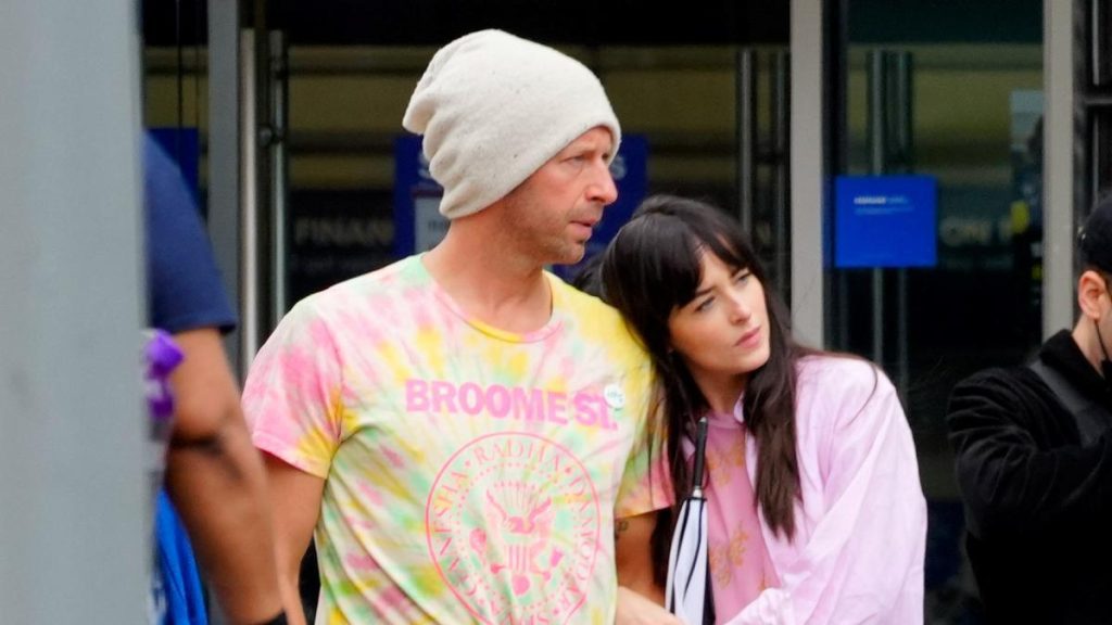 Chris Martin and Dakota Johnson are being harassed by a woman who claims to be the wife of the Coldplay leader