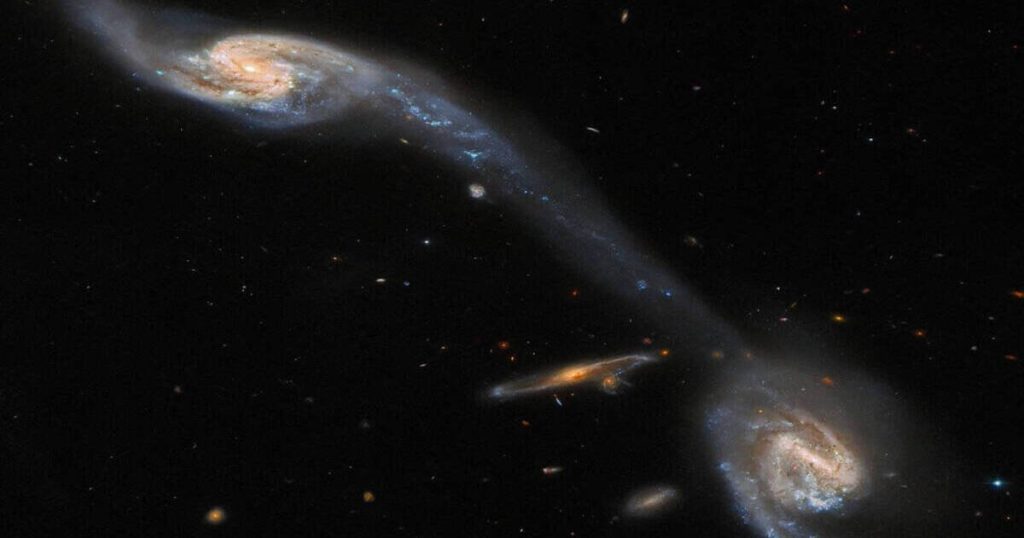 NASA's Hubble Telescope Immortalizes an Amazing Cosmic Bridge