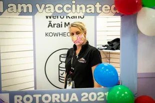 A health worker stands at a vaccination center in Rotorua, New Zealand on Saturday, October 16, 2021.